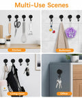 Black Self Adhesive Hooks 20 Pack Tough As Nails Sticky Wall Hangers With Super Grip arranged for kitchen, bathroom, living room, and office.