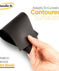 Hand holding Totally Flexible 30 Mil Magnetic Sheets For Crafts 8.5 By 11 Inches Pack Of 2 Non Adhesive Magnet Paper for curved surfaces.