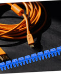Gotta Keep Your Desk Or Garage Slick With These 150 Piece Digital Number Wire Label Tubes on orange cords for cable organization.