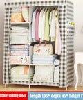 Game Changer Portable Wardrobe Closet Organizer With Dustproof Nonwoven Cover And Solid Steel Frame Featuring Built In Shelves Side Pockets And Hassle Free Assembly For Dorms Or Apartment Living with clothes and blankets visible.