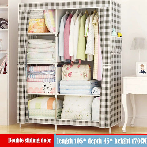 Game Changer Portable Wardrobe Closet Organizer With Dustproof Nonwoven Cover And Solid Steel Frame Featuring Built In Shelves Side Pockets And Hassle Free Assembly For Dorms Or Apartment Living with clothes and blankets visible.
