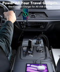 Four Port Car Charger With Voltmeter 78W Fast Charge USB C And USB A Hub powering devices in car interior