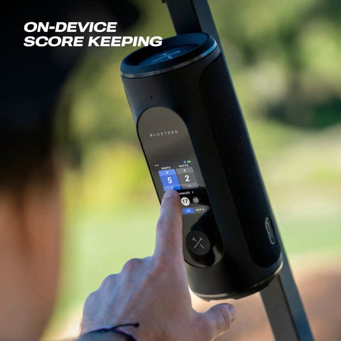 Person using AI Powered Golf GPS Speaker With Touchscreen Yardages, Hazards And Music, scoring feature on course