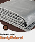 Heavy Duty 8x10 Ft Tarp Waterproof 10 Mil Thick Reversible Silver And Brown Outdoor Cover showing sturdy material and weave count