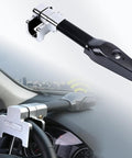 Secure Your Daily Rig With This Motion Activated Steering Wheel Lock featuring a black and silver design, installed on a steering wheel.