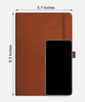 Everyday Carry Graph Grid Paper Notebook In A5 Size With Leather Hardcover, 192 Pages, 100 GSM Thick Paper next to a smartphone.