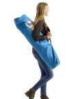 Person carrying Canopy Shade Folding Chair For Camping With Adjustable Shade Canopy And Tilt UV Blocking 190T Polyester in blue bag