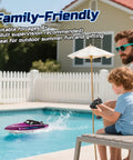 Child playing with Fast Remote Control Boat For Adults With LED Lights And Self Righting, 15 MPH Racing RC Boat With 3 Speed Modes, Ideal For Pools And Lakes, Comes With 2 Rechargeable Batteries For 30-40 Minutes, Purple WF17 in pool