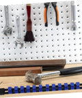 Slick 6 Piece Socket Organizer Tray With Fast Match Labels and Chunky Base for Rock Solid Stability on a workbench with tools.