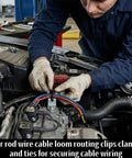 Mechanic uses 200 Piece All In One Wire Loom Routing Clip Kit For Automotive Wiring Harness Clips And Ties Set under car hood