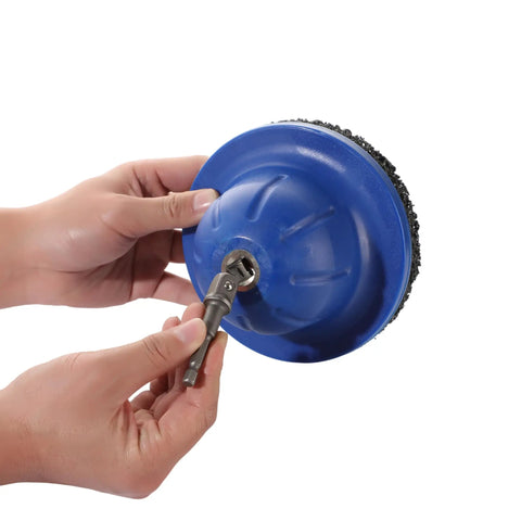 Hands holding Six Inch Wheel Hub Resurfacing Kit with polisher, drill adapter visible for DIY rust removal on wheel hubs.