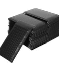 Stack of Padded Bubble Mailers Self Seal Envelopes 12x18 And 4 Inch Thickened Black Shipping Bags 100 Pack for small biz packaging.