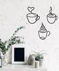 Three Piece Coffee Cup Wire Wall Art Set For Coffee Bar Decor Vintage Rustic Metal Signs displayed on a white brick wall.