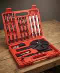 Thinking Process: red hard steel bearing extractor puller tool kit with threaded screws and three-arm puller in case