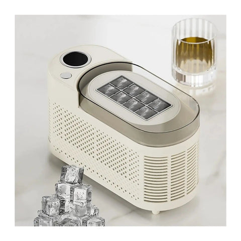 Slick Countertop Ice Maker, Portable Mini Electric Machine making crisp fresh cubes on countertop near whiskey glass.
