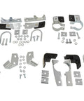 Upgrade Your Ride With This Cool Made In USA Exhaust Hanger Kit For 61 And 62 Chevy Corvette C1 Plus Fine Thread U Bolts And Clamps., assorted metal brackets and U-bolts laid out on white