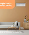 Living room with No Hassle Duct Opening Heater Vent Deflector Wall Grille, adjustable front blades, white rustproof vent cover.