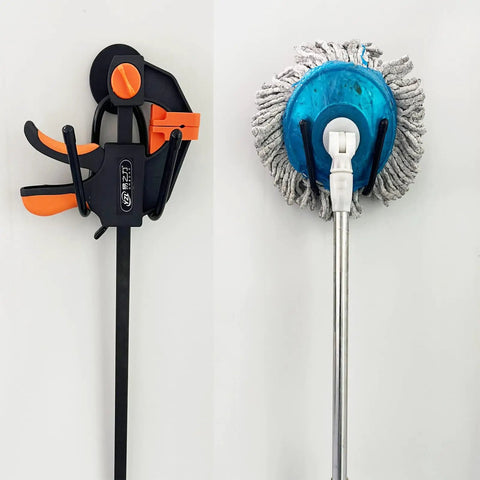 Clamp and mop hanging from 2 Pack Heavy Duty Magnetic Garage Hooks With Rubber Coated Magnets, No Drill Wall Hangers