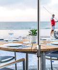 Outdoor Umbrella Clamp Heavy Duty Stainless Steel Deck Mount With Adjustable Arm And Umbrella Hook Accessory on table