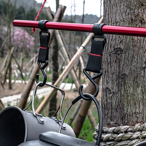 Five Piece Large Outdoor Camping Hook Set featuring S Shaped Movable Strap Hooks installed on a tree branch holding pots
