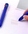 Person using 10 In 1 Multicolor Retractable Ballpoint Pens Set With 0.7mm Tips Navy Blue Barrel Includes Black Blue Red Orange Yellow Pink Brown Light Blue Green Your Go To Office And School Writing Kit For Students Gifts on lined paper