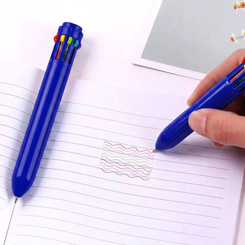 Person using 10 In 1 Multicolor Retractable Ballpoint Pens Set With 0.7mm Tips Navy Blue Barrel Includes Black Blue Red Orange Yellow Pink Brown Light Blue Green Your Go To Office And School Writing Kit For Students Gifts on lined paper