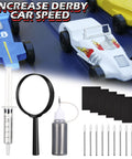 Pinewood Derby Car Polishing Kit With Graphite Powder, Buffing Wool Head, Magnifying Glass, Flat File, Micro Porous Polishing Spears, And Sandpaper Set To Cut Bore Friction For Faster Rides displayed with derby cars in background