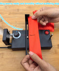 Person using Heat Cutting Ribbon And Rope Cutter Electric With Adjustable Temperature Portable Thermal Cutter for smooth seals