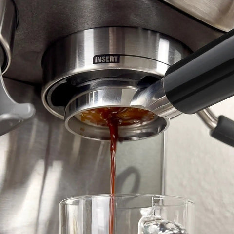 54mm Bottomless Naked Portafilter For Breville Sage Barista Series Espresso Machines Including Barista Express Pro Touch Infuser Duo Temp Pro BES870 BES878 BES880 extracting coffee shot into glass