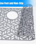 Silicone Sink Protector Mat For Kitchen Sink 28.25 X 15.25 Inches showing raised feet, non-slip design, with rear drain hole.
