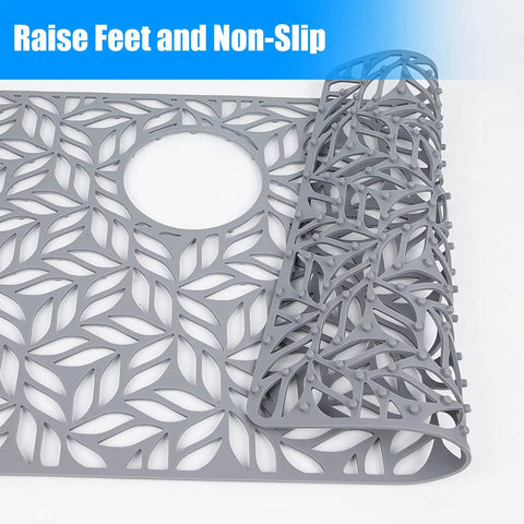 Silicone Sink Protector Mat For Kitchen Sink 28.25 X 15.25 Inches showing raised feet, non-slip design, with rear drain hole.