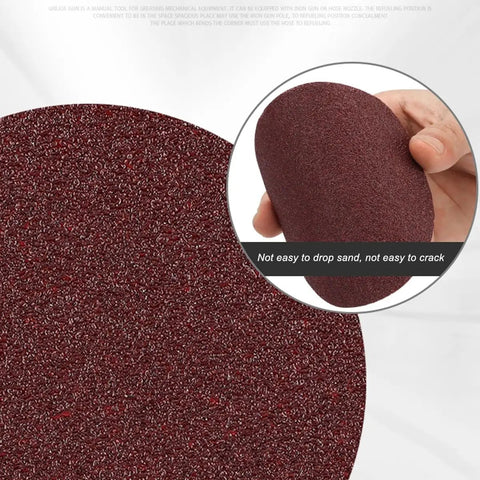 Close-up of a 4 inch silicone carbide sanding disc from the Ultimate 100 Pack Of 4 Inch Hook And Loop Sanding Discs With 15 Grits From Coarse To Ultra Fine.