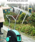 Portable Metal Hose Reel Cart With Smooth Rolling Wheels And Easy Step Operation Garden Hose Organizer with long hose in use.