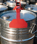 Heavy Duty Vertical Drum Lifter For 55 Gallon Steel Or Plastic Barrels Handles Up To 1100 Pounds with red clamp on steel drum lid.