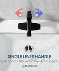 Overhead view of Matte Black Bathroom Faucet With One Hole And Deck Plate pouring water into a sink, single lever handle shown.