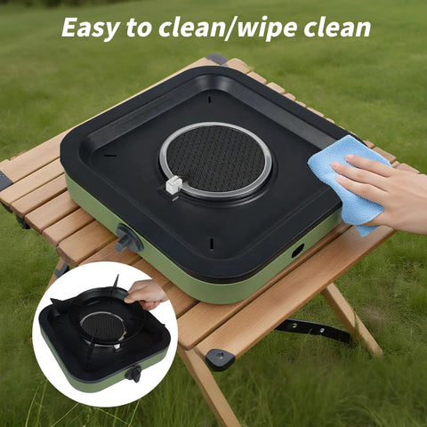 Portable Propane Camping Stove With Single Burner Windproof Design Includes Gas Hose And 10.6 Inch Carry Bag on table being cleaned
