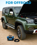 12V Dual Cylinder Air Compressor With Digital Display Panel And Auto Stop Inflation next to SUV on sandy terrain
