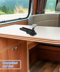 Rubber Draw Latch For Coolers And Cargo Boxes Heavy Duty Black Hood Latch displayed on RV table