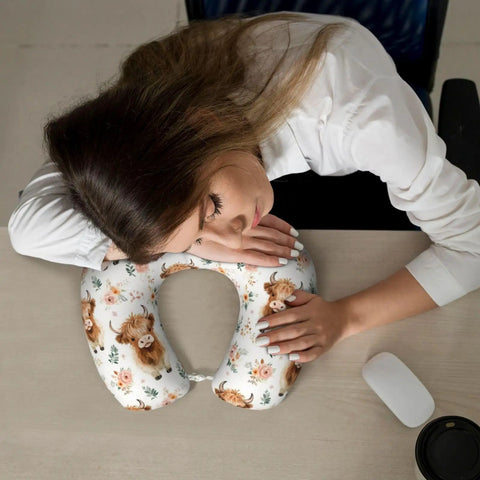 Woman resting on Cute Highland Cow Memory Foam Travel Pillow For Neck Support U Shaped Travel Cushion For Airplane Car And Office