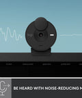 Crisp 1080P Full HD Webcam Featuring Auto Light Correction, black design with noise-reducing mic for streaming and video calls.