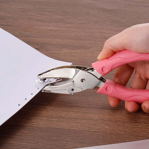 Using Dual Size Circle Hole Punch Set for Paper Craft with pink soft grip; 1/16" and 1/8" holes on paper, DIY tool for scrapbooking.