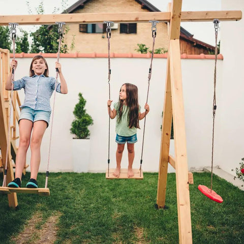 Children using swings on wooden playset with Silent Ball Bearing Swing Hangers, Heavy Duty 360 Degree Rotating Swing Swivel Hooks.