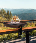 Deck Mounted Metal Bird Bath With Adjustable Steel Clamp For Railings And Balconies No Fuss Lightweight Detachable Bowl Weatherproof Rust Resistant Stand That Secures To Deck Rail Against Wind in use with bird.