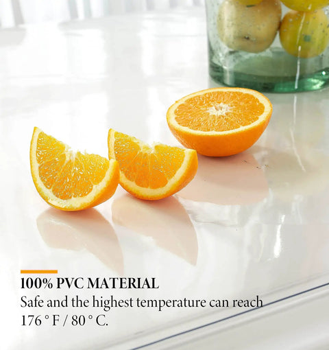 Clear Desk Protector 1.5mm Thick 14 By 24 Inches Heavy Duty Vinyl Desk Pad with orange slices on top showing transparency.