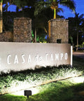 Stone entrance sign for Casa de Campo illuminated by 2 Pack 50W Outdoor LED Flood Lights With Dusk To Dawn Photocell, IP65 Waterproof