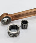 YD100 Connecting Rod With Needle Bearing Set for 2 Stroke Gas Motorized Bicycle, showing silver bearings and copper rod.