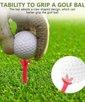 Gloved hand placing a golf ball on a red tee from Assorted Color Plastic Golf Tees 100 Count, 2.8 Inch Length, Durable Bulk Tees