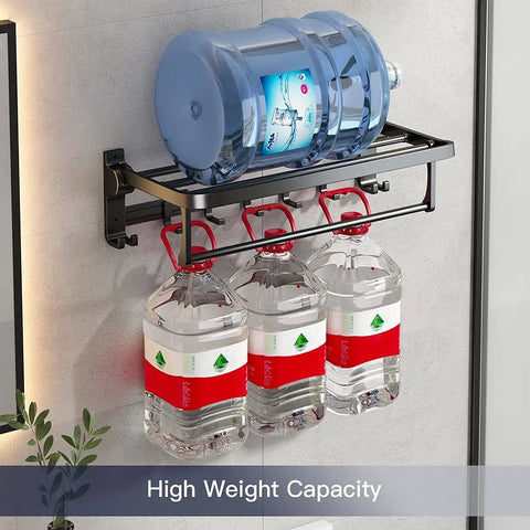 24 Inch Foldable Towel Rack With Movable Hooks And Towel Bar, Space Saving Wall Mount Shelf For Tiny Bathrooms, Rustproof Aluminum, Matte Black Finish, supporting heavy water bottles, demonstrating weight capacity.