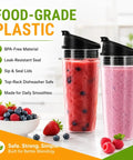 Two Pack 18 Ounce Blender Cups With Sip N Seal Flip Lids Replacement for High Power Countertop Blenders, filled with smoothies