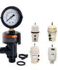 Front view: air relief valve with gauge; black plastic body, orange warning label, set of beige filter canisters nearby
